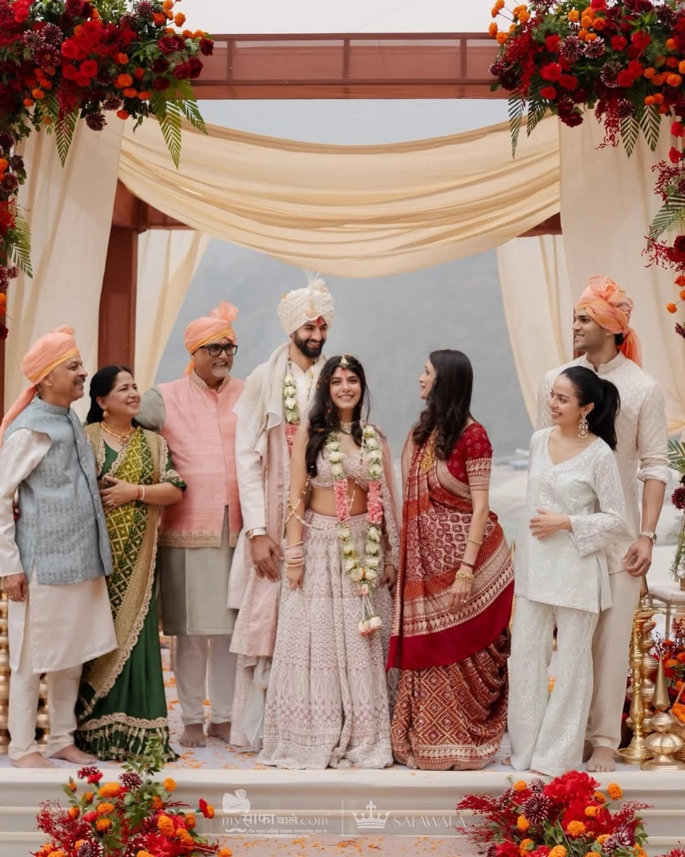 Royal red wedding safa and embroidered groom styling for Akshi